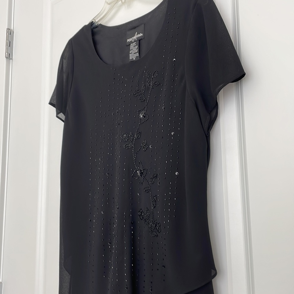 2-piece beaded black top and skirt